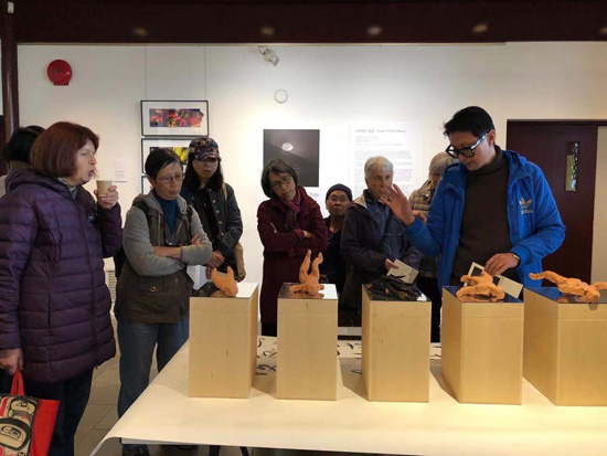 Artist/curator Lam Wong was giving the curator's tour during Heart of the City Festival